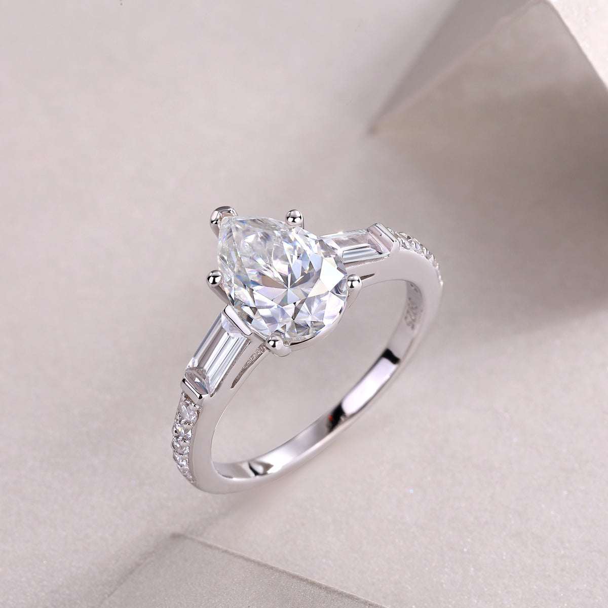 moissanite solitaire ring 925 sterling silver pear cut minimalist luxury